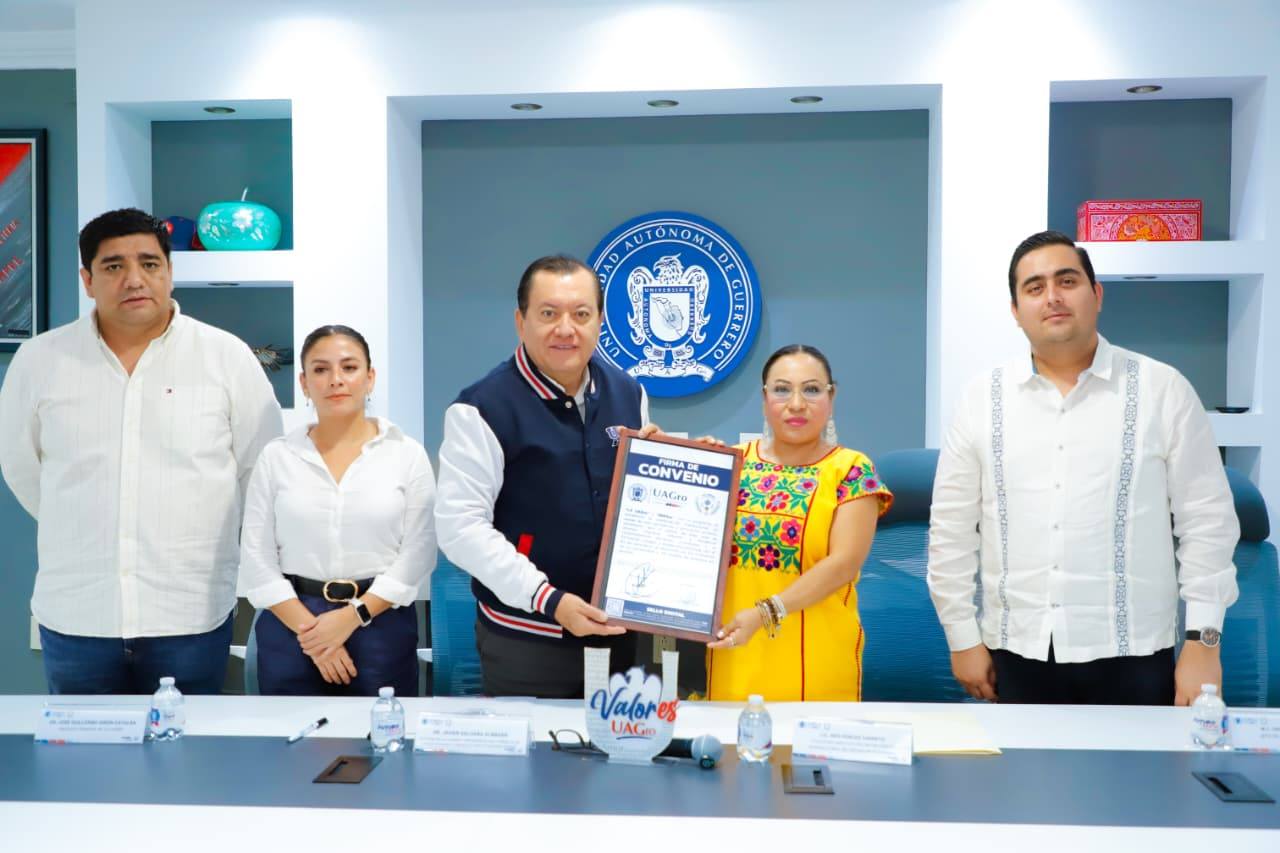 Firma Javier Saldaña convenio de colaboración entre la UAGro y el IBEGro